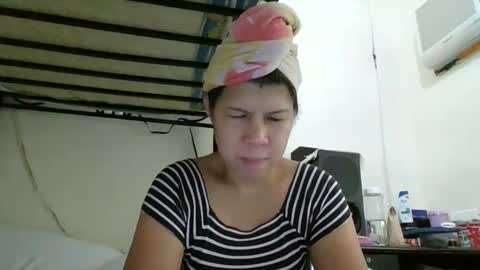 Snapshot of wildbrownchick69 chatting on January 24, 6:35 am WildChick online show from January 24, 6:35 am